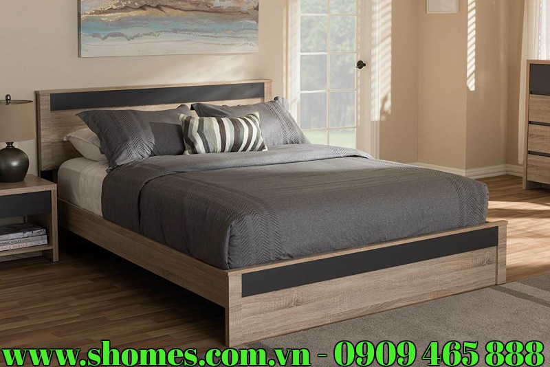 Giường ngủ gỗ sồi là một trong những sản phẩm được nhiều người ưu tiên lựa chọn hiện nay. Sở dĩ như vậy là bởi vì mẫu giường ngủ làm từ chất liệu gỗ sồi luôn được đánh giá cao ở độ bền cũng như giá trị thẩm mỹ. Do đó, nếu bạn đang muốn tìm cho gia đình mình một bộ giường ngủ thì đây chính là lựa chọn phù hợp. Tuy nhiên, giường ngủ bằng gỗ sồi cũng có nhiều thiết kế, mẫu mã, thiết kế khác nhau và bạn đang phân vân chưa biết nên chọn sản phẩm nào thì có thể tham khảo thêm bộ giường ngủ gỗ màu nâu xám sang trọng, lịch lãm sau đây.  NHỮNG THÔNG TIN CHI TIẾT VỀ BỘ GIƯỜNG NGỦ GỖ SỒI MÀU NÂU XÁM CẤU TẠO SẢN PHẨM GIƯỜNG NGỦ GỖ SỒI MÀU NÂU XÁM:  Mẫu giường ngủ hiện đại được thiết kế bao gồm những bộ phận chính như sau: khung thành giường, đầu giường, chân giường và mặt giường. Đây là kết cấu phổ biến của một chiếc giường truyền thống và điểm khác biệt là ở thiết kế mỗi sản phẩm. Các bộ phận, chi tiết có thể tháo lắp một cách dễ dàng thông qua các khớp nối cũng như đinh, vít…  CHẤT LIỆU CAO CẤP, BỀN BỈ CỦA GIƯỜNG NGỦ GỖ SỒI MÀU NÂU XÁM  Chất liệu chính tạo nên mẫu giường này đó là gỗ sồi. Đây là loại gỗ tự nhiên được chọn lọc kỹ lưỡng, nên đảm bảo yêu cầu về độ bền đẹp, đảm bảo không bị nứt nẻ, cong vênh hay mối mọt trong quá trình sử dụng.  GIƯỜNG NGỦ GỖ SỒI MÀU NÂU XÁM VÀ THÔNG SỐ KỸ THUẬT:   Kích thước: 214,6cm (chiều dài) x 166cm (chiều rộng) x 91,4cm (chiều cao)  Trọng lượng: 82kg  THIẾT KẾ MỚI MẺ, ĐỘC ĐÁO CỦA GIƯỜNG NGỦ GỖ SỒI MÀU NÂU XÁM   Giường ngủ gỗ sồi được thiết kế theo phong cách hiện đại, vô cùng mới lạ, độc đáo, dễ tạo được ấn tượng đặc biệt với nhiều người.  Điểm khác biệt của sản phẩm này đó là chân giường được làm từ ván gỗ, không quá cao. Mặt giường là những ván gỗ được ghép sát với nhau, tạo sự ổn định, vững chắc trong quá trình sử dụng. Những tấm ván này có thể tháo rời một cách dễ dàng, thuận tiện cho người dùng.  Với thiết kế đặc biệt, mẫu giường ngủ đẹp này sẽ làm điểm nhấn nổi bật, giúp không gian sống trở nên nên hoàn hảo và đẳng cấp hơn.  GIƯỜNG NGỦ GỖ SỒI MÀU NÂU XÁM VỚI MÀU SẮC TINH TẾ, TỰ NHIÊN:   Giường ngủ gỗ với sự kết hợp của màu nâu gỗ tự nhiên và màu xám đậm vô cùng tinh tế. Đây là những gam màu phổ biến trong thiết kế nội thất không gian. Thiết kế giường ngủ với tông màu này không chỉ tạo cho người dùng cảm giác tự nhiên, thân thiện và gần gũi mà nó còn giúp cho không gian sống trở nên sang trọng và hiện đại hơn.  Đặc biệt, với những gam màu này bạn cũng dễ dàng hơn khi kết hợp nó với các món đồ trang trí khác trong không gian.  NGUỒN GỐC XUẤT XỨ CỦA GIƯỜNG NGỦ GỖ SỒI MÀU NÂU XÁM:   Bộ giường ngủ gỗ màu nâu xám sang trọng, lịch lãm có xuất xứ tại Việt Nam, được sản xuất bởi công ty IMART – địa chỉ chuyên cung cấp giường ngủ giá rẻ tphcm uy tín, chất lượng. Trước khi sản phẩm được đưa ra thị trường đã phải trải qua quá trình sản xuất  và kiểm định chất lượng nghiêm ngặt. Vậy nên khách hàng khi lựa chọn sản phẩm này hoàn toàn có thể yên tâm về chất lượng cũng như độ an toàn.  NHỮNG LỢI ÍCH TUYỆT VỜI CỦA BỘ GIƯỜNG NGỦ GỖ SỒI MÀU NÂU XÁM   ️ Giường ngủ gỗ sồi màu nâu xám dù mới xuất hiện trên thị trường những rất được nhiều khách hàng quan tâm và ưu tiên lựa chọn. Điều này xuất phát từ những lợi ích tuyệt vời mà sản phẩm này mang lại. ️ Giường ngủ tinh tế, hiện đại góp phần làm nổi bật được vẻ đẹp của không gian phòng ngủ, giúp nó trở nên hoàn hảo hơn, thể hiện được cá tính cũng như gu thẩm mỹ của gia chủ. ️ Thiết kế giường ngủ phong cách hiện đại được đơn giản hóa đến mức tối đa giúp nó dễ thích ứng với nhiều không gian khác nhau. Đặc biệt, thiết kế này còn giúp không gian trở nên rộng rãi, thoải mái hơn.   ️ Mẫu giường ngủ này được thiết kế tương tự như những mẫu giường ngủ kiểu bệt, chân giường có độ cao vừa phải, đảm bảo an toàn trong quá trình sử dụng, nhất là những gia đình có người già và trẻ nhỏ. ️ Điều quan trọng nhất là giường ngủ gỗ mang lại cho bạn và người thân một không gian nghỉ ngơi thoải mái nhất. Đó là nơi để bạn có thể tận hưởng một giấc ngủ ngon qua đêm, giúp tinh thần tỉnh táo và có thêm nguồn năng lượng cho một ngày mới. Như vậy, có thể nói giường ngủ gỗ đẹp là rất cần thiết đối với cuộc sống của con người. Chính vì thế nó đã và đang trở thành một vật dụng cần thiết, không thể thiếu trong không gian nhà ở. Vậy nên nếu bạn cũng đang mong muốn sở hữu một sản phẩm tiện ích như thế này thì hãy nhanh chóng liên hệ với IMART để được tư vấn lựa chọn sản phẩm phù hợp nhất.  CÔNG TY CỔ PHẦN ĐẦU TƯ THƯƠNG MẠI IMART    130, Đường Cao Đức Lân, phường An Phú, quận 2, TPHCM  Hotline:  0909 465 888    Email: noithatshomes@gmail.com  Website: www.shomes.com.vn  Tìm kiếm nhiều về giường ngủ:  giường ngủ hiện đại, giường ngủ thông minh, giường ngủ đẹp, giường ngủ có ngăn kéo, giường ngủ giá rẻ, giường ngủ gỗ, bộ giường ngủ đẹp, bộ giường ngủ cao cấp, bộ giường ngủ giá rẻ, bộ giường ngủ hiện đại, bộ giường ngủ gỗ sồi, bộ giường ngủ xuất khẩu, giường ngủ cổ điển, giường ngủ có hộc, giường ngủ cho phòng nhỏ, giường ngủ giá rẻ hcm, ngủ giá rẻ tphcm, giường ngủ gỗ đẹp, giường ngủ hcm, kê giường ngủ theo phong thủy, giường ngủ loại tốt, mua giường ngủ ở đâu tphcm, giường ngủ phong cách hiện đại, giường ngủ phong cách cổ điển, giường ngủ sang trọng, giường ngủ tân cổ điển