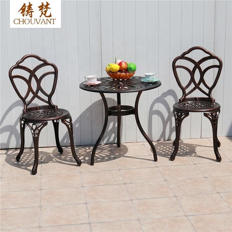 Bộ Bàn Ghế Nhôm Đúc Tròn 2 Ghế Hoa Văn Đan Lưới Màu Nâu Đồng Bộ Bàn Ghế Nhôm Đúc Tròn 2 Ghế Hoa Văn Đan Lưới Màu Nâu Đồng - hình 2