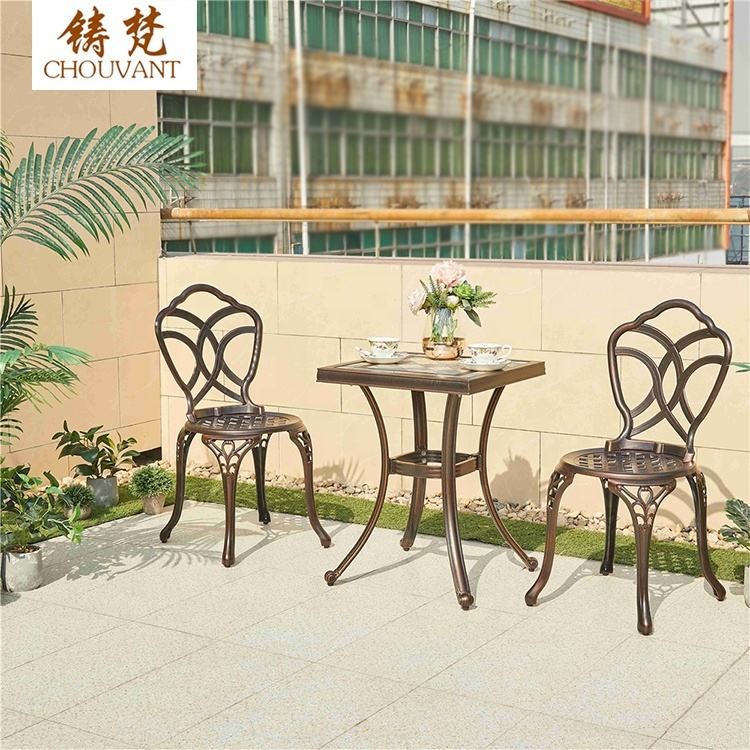 Bộ Bàn Ghế Nhôm Đúc Tròn 2 Ghế Hoa Văn Đan Lưới Màu Nâu Đồng Bộ Bàn Ghế Nhôm Đúc Tròn 2 Ghế Hoa Văn Đan Lưới Màu Nâu Đồng - hình 5