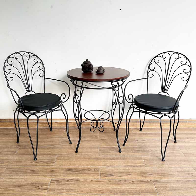 Bộ bàn tròn và 2 ghế sắt hoa văn C Bộ bàn tròn và 2 ghế sắt hoa văn C - hình 2